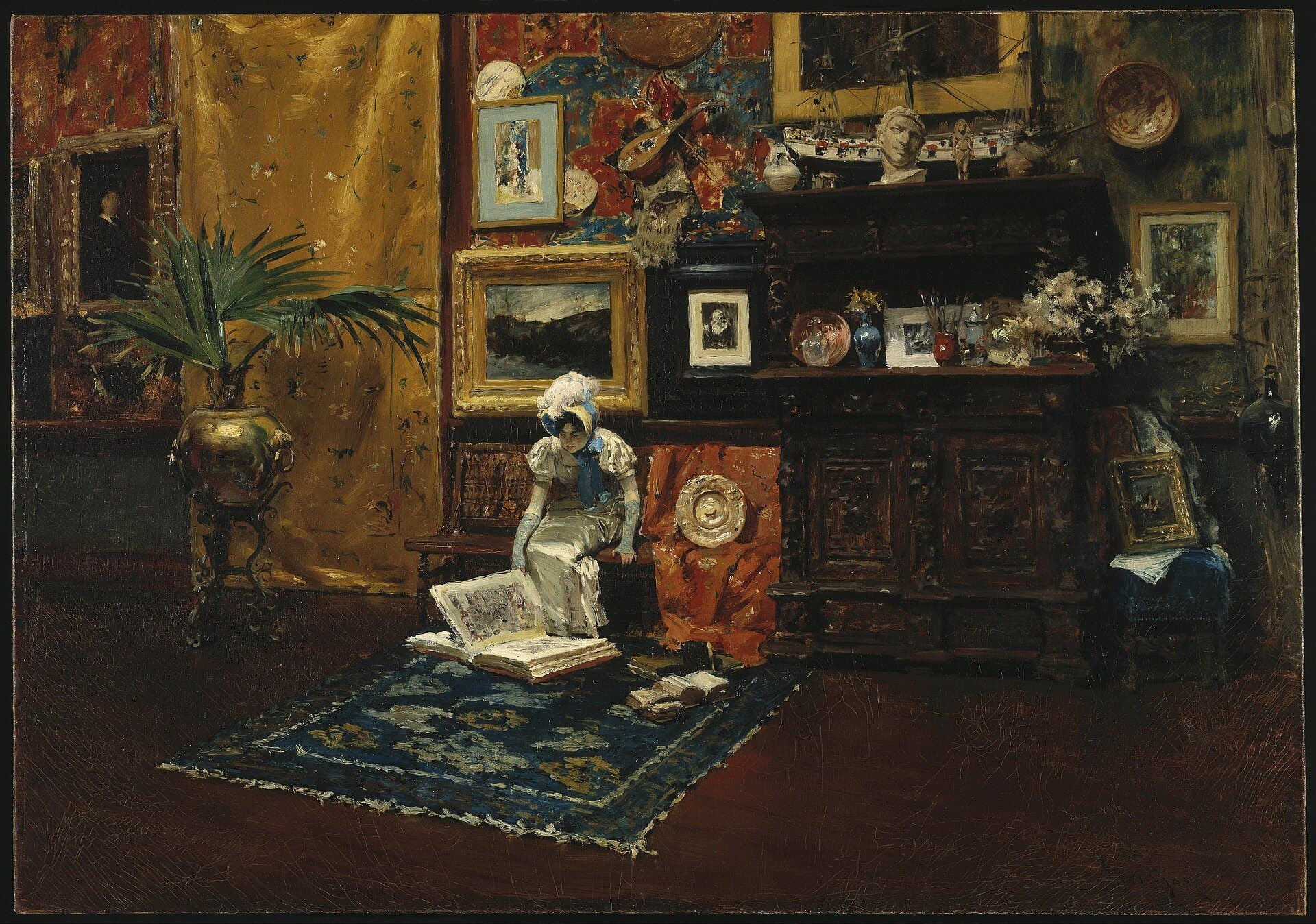 A painter's studio hung floor to ceiling with work