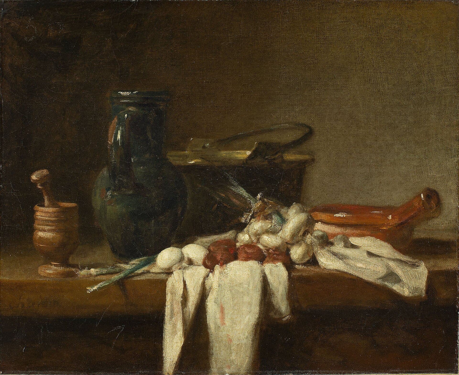 Studio vessels and cloth on a bare table