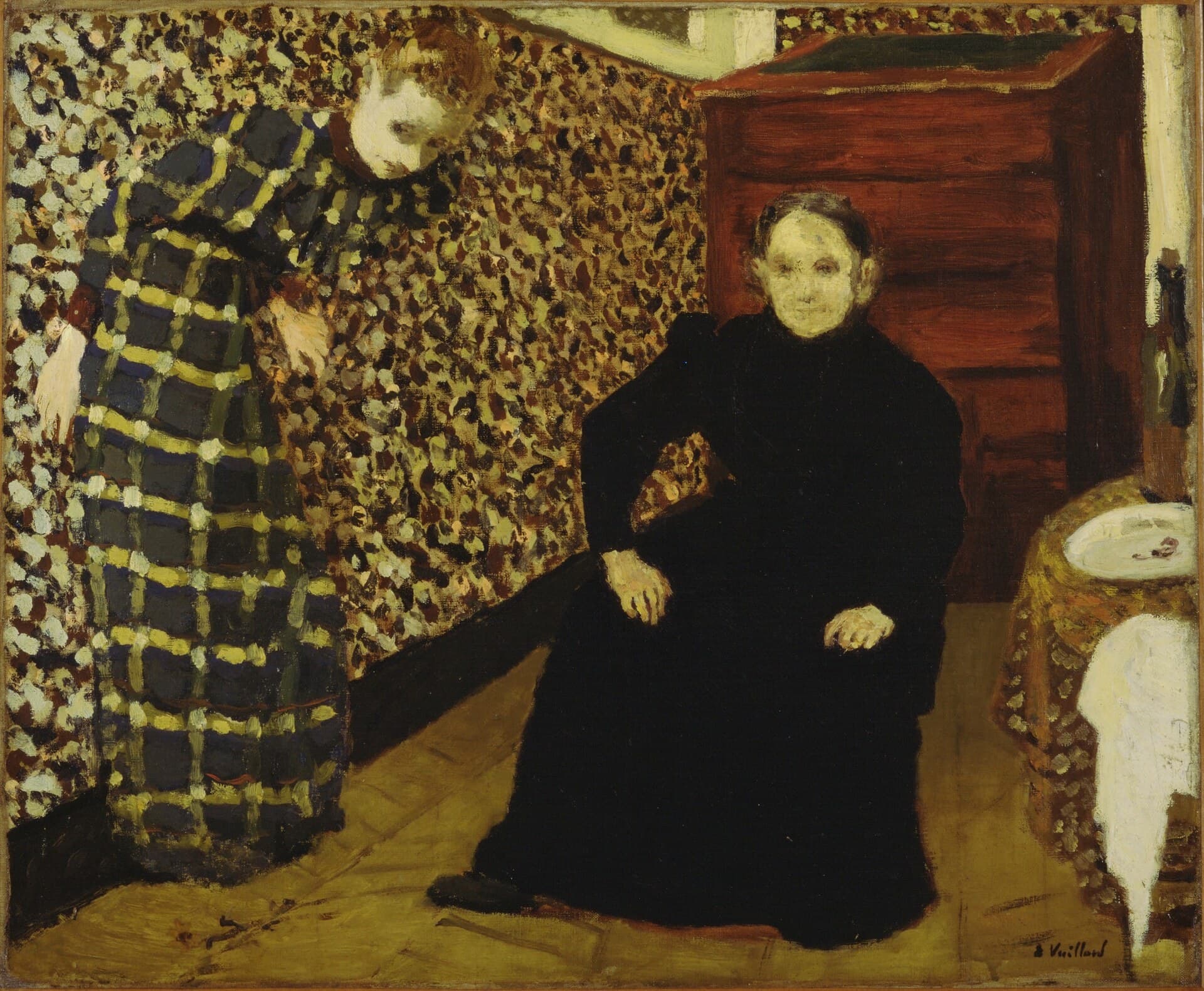 A dim patterned interior, two figures still against the wallpaper